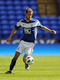 Images Dated 29th August 2010: Roger Johnson in Action for Birmingham City Against Bolton Wanderers at Reebok Stadium