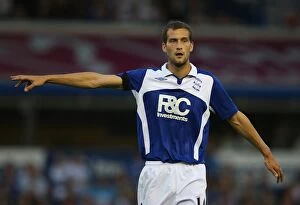 Images Dated 19th August 2009: Roger Johnson in Action: Birmingham City vs Portsmouth, Barclays Premier League (August 19, 2009)
