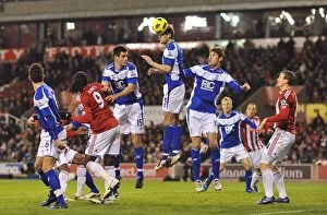 Images Dated 9th November 2010: Roger Johnson: Heading Clear for Birmingham City at Britannia Stadium