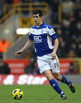 Images Dated 12th December 2010: Scott Dann of Birmingham City Faces Off Against Wolverhampton Wanderers in the Barclays Premier