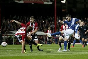 Images Dated 29th September 2015: Sky Bet Championship Showdown: Jonathan Grounds Glory Bid at Griffin Park - Brentford vs