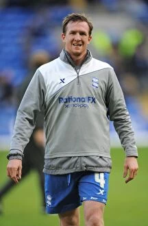 Images Dated 4th December 2011: Steven Caldwell Leads Birmingham City in Npower Championship Showdown at Cardiff City Stadium