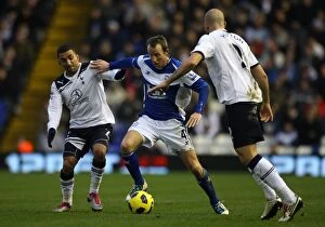 04-12-2010 v Tottenham Hotspur, St. Andrew's Collection: A Tense Triangle: Bowyer, Hutton, and Lennon Clash in Birmingham City vs. Tottenham Hotspur