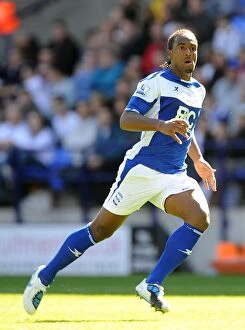 29-08-2010 v Bolton Wanderers, Reebok Stadium Collection: Thrilling Goal: Cameron Jerome Scores for Birmingham City Against Bolton Wanderers in Premier