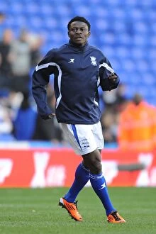 Images Dated 12th February 2011: Thrilling Showdown: Obafemi Martins of Birmingham City vs Stoke City (Premier League, 12-02-2011)