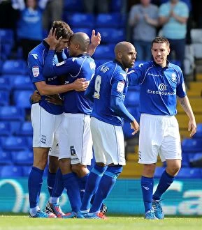 Images Dated 18th August 2012: Zigic and Davies: Birmingham City's First Goal Celebration vs. Charlton Athletic (18-08-2012)